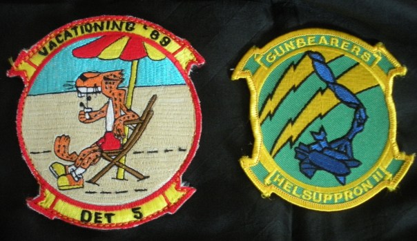 The patch on the right is the helicopter squadron's official insignia while the patch on the left was custom-made in the Philippines for the specific deployment (in 1989) and detachment (Det. 5) from the unit.