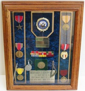 This group of medals from a USS Enterprise veteran largely contains modern hardware. The dog tags appear to be original to the veteran (source: eBay image).