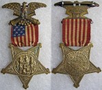 I managed to source a GAR membership medal for inclusion in the shadow box. This example shows the obverse and reverse of a GAR medal from 1886 (source: OMSA database).