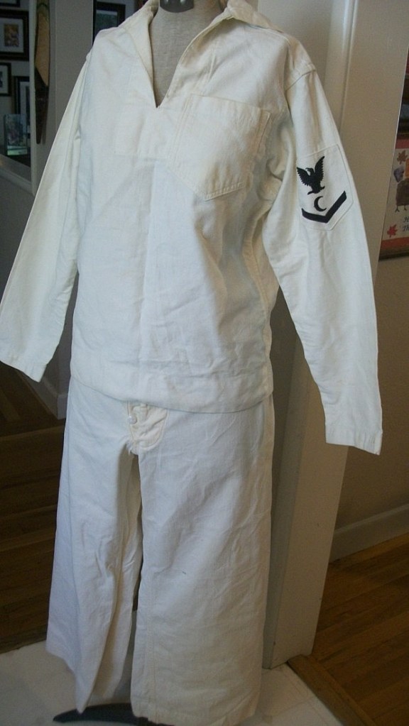 For the bargain-basement price of less than $11.00, I was able to acquire this fantastic tailor-made set of WWII-era dress whites with the precise rating badge I had been seeking (source: eBay image).