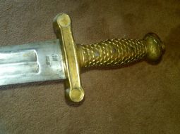 Showing the hilt and maker's marks on the Ames Model 1832 Artillery Foot Sword.