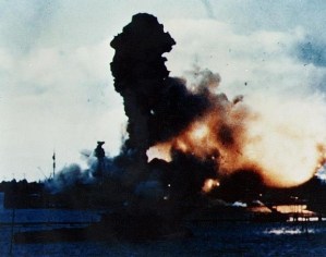 A rare color image showing the USS Arizona’s forward magazine detonating after it was struck by a high altitude aerial bomb (Source: U.S. Navy Naval History and Heritage Command).