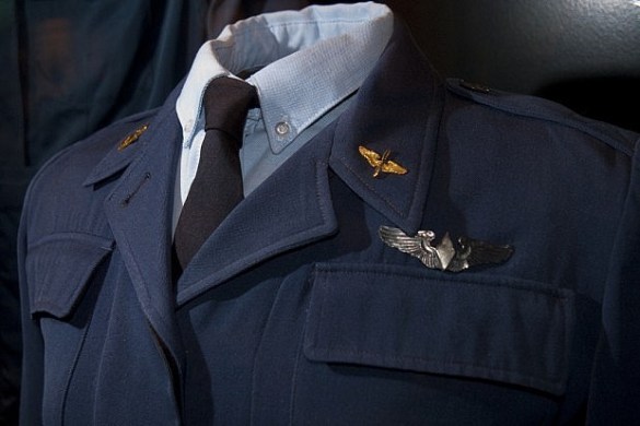 During World War II, women pilots were needed to ferry aircraft from the manufacturers to the troops, saving the experienced aviators for front-line combat. This beautiful WASP uniform features pilot wings.